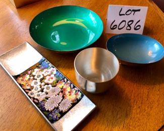 Lot 6086 $50.00. 4 pcs. 1960's era Reed & Barton Enameled over silver: 1) Footed Blue Oval Dish #143. 5" x 4". 2) Green Dish #194 7.5" diameter. 3) Somerset Pewter cup 3"d x 2..5" t, 4) 3x9 Enamelware Painted Tray - Pretty band of flowers on a pearl background