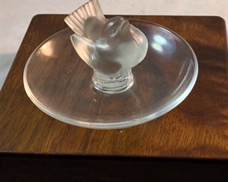 Lot 6096. $75.00. Lalique "Pinson" pin/ring dish with a frosted bird on a pedestal with a clear glass tray.