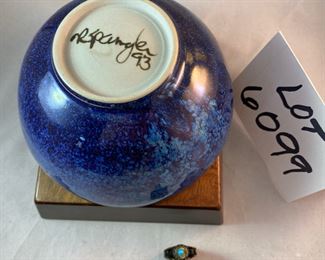 Lot 6099. $75.00 Ross Spangler Blue bowl (6"d x 3.25"t) signed by artist 1993, a cute chickadee pottery bowl (5"dia x 2.75"t), mini filigree perfume bottle Made in France with a turquoise top, Coalport Bone China British Birds "The Jay" covered dish (5"d x 1"t).