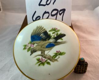 Lot 6099. $75.00 Ross Spangler Blue bowl (6"d x 3.25"t) signed by artist 1993, a cute chickadee pottery bowl (5"dia x 2.75"t), mini filigree perfume bottle Made in France with a turquoise top, Coalport Bone China British Birds "The Jay" covered dish (5"d x 1"t).