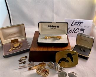 Lot 6103. $48.00 Lot of 11 pieces of nice men's jewelry:
Elk Tie stud sterling, Trout and Geese Brass belt buckle, Gideon Tie Clip & pin, Krementz gold filled men's jewelry, 3 pr of men's cuff links, 1 Krementz money clip. I Still think Krementz is one fine costume jewelry maker - most of their items are gold-filled but very classy looking.
