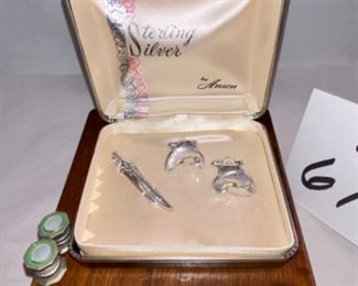 Lot 6104. $25.00. Anson sterling silver trout cuff links and fly rod tie clip. Great gift for your favorite fly! Also includes 5 vintage pocket knives (bakelite or mother of pearl), a mini spray can (that works!), and 2 tie pins?