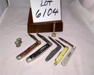 Lot 6104. $25.00. Anson sterling silver trout cuff links and fly rod tie clip. Great gift for your favorite fly! Also includes 5 vintage pocket knives (bakelite or mother of pearl), a mini spray can (that works!), and 2 tie pins?