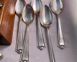 Lot 6105.$60.00. 6 sterling cocktail forks, 5 sterling demitasse-spoons, lipstick case w/mirror, filigree silver pendant w/lapis & coral stones, 2 thimbles, covered decorated lacquered and a "faux" ivory string box.