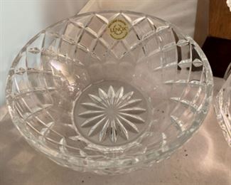 Lot 6106. $45.00. Textured lead crystal ice bucket w/tongs (6"t x 4"dia), crystal covered jelly jar fruit shaped,(5"t x 3"dia), Kosta signed bowl (4"w x 3"t), lenox bowl (5"dia x 2"tall).