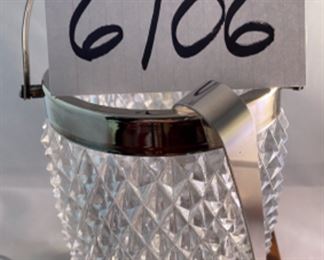 Lot 6106. $45.00. Textured lead crystal ice bucket w/tongs (6"t x 4"dia), crystal covered jelly jar fruit shaped,(5"t x 3"dia), Kosta signed bowl (4"w x 3"t), lenox bowl (5"dia x 2"tall).