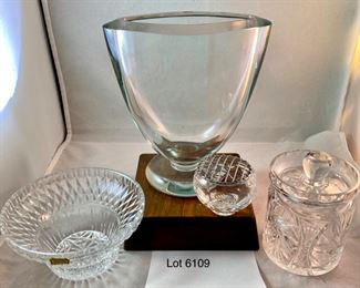 Lot 6109. $50.00- Four Items. Lead Crystal Footed Vase (uber heavy and great looking)(6.5"t x 6"w x 3.5"d), Crystal covered jam jar (4" x 3"), Lead crystal candy bowl and tiny crystal bowl with floral wire lid. Sweet!!