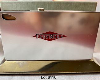 Lot 6110 $80.00. What a Lot! Beautifully Crafted Jeffrey Seaton Wood Design "Mountain Lilac Burl" Wooden Box 5.5" W 3" D x 2.75 H; Esprit Table Lighter 3.5" W x 2.5" with Advertising; Footed Pen Holder with World Map "Yaco di Firenze" Made in Italy, 3.5" x 3" Diam.