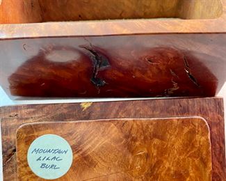 Lot 6110 $80.00. What a Lot! Beautifully Crafted Jeffrey Seaton Wood Design "Mountain Lilac Burl" Wooden Box 5.5" W 3" D x 2.75 H; Esprit Table Lighter 3.5" W x 2.5" with Advertising; Footed Pen Holder with World Map "Yaco di Firenze" Made in Italy, 3.5" x 3" Diam. Oooh la la this box is Sensational!!