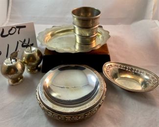 Lot 6114 $180.00. Sterling Silver Lot includes: 259 grams Sterling, not including the weighted item. Includes:Tray with Scalloped Edge; Apple S&P Shaker; 3.33 oz Jigger Shot Glass; Small pin dish Bowl with reticulated edge and weighted sterling.