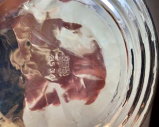 Lot 6114 $180.00. Sterling Silver Lot includes: 259 grams Sterling, not including the weighted item. Includes:Tray with Scalloped Edge; Apple S&P Shaker; 3.33 oz Jigger Shot Glass; Small pin dish Bowl with reticulated edge and weighted sterling.