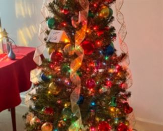 Lot 6116. $120.00. It's Christmas in March! 5.5' Tree, completely decorated with lots of ornaments, garland, tree skirt, star on top, colored lights, snow globe, shiny brite vintage ornaments, snowman bowl with greens, 3 teddies beneath, 3 candles. You don't need another thing! Ho Ho Ho,