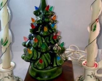 Lot 6118 $40.00. 2 Spode Christmas Candle Holders, 2 twisted Christmas tapers, and one ever popular Ceramic Tree with Lightsl (one of the little light covers has walked away - display that one in the back