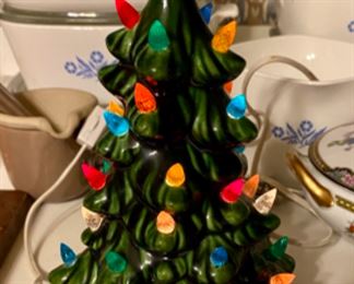 Lot 6118 $40.00. 2 Spode Christmas Candle Holders, 2 twisted Christmas tapers, and one ever popular Ceramic Tree with Lightsl (one of the little light covers has walked away - display that one in the back