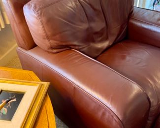 Lot 6120. $450. Leather Club Chair with Ottoman. Plush Brown Buttery Leather; no branding. Easily could be your favorite piece of furniture in your home - it is remarkably comfortable. I forecast a number of naps will take place in this super chair - nice wide arms, so you can work on your laptop or hold your toddler and read him or her a book without being squished. Don't be put off by the wrinkle on the back of the chair - it does not readily show in person and when I say this is NICE, I mean it. "34.5"" back, seat 18""h, arm 2 arm 40"", depth 36"".
depth of seat 23"", width of seat 21""w. Ottoman 24""sq, 17""h"