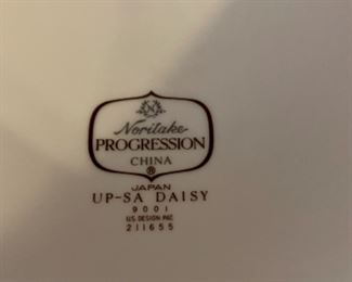 Lot 6122. $125.00. Noritake Mid Century Progression China Pieces "Daisy" (8 coffee cups, 6 saucers, 2 rectangular serving bowls, 1 round serving bowl, 6 salad/soup bowls, 5 Bread Plates, 2 lidded bakeware, Gravy boat, sugar and creamer). We have dinner plates for this set, but the flowers have worn off on the majority of them and felt it detracted from the beauty of these pieces. The buyer of this set is welcome to have the dinner plates as well. There are at least 6 dinner plates (there are probably more than that, but I don't remember the full number).