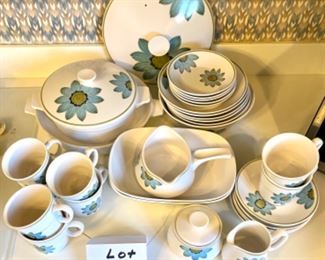 Lot 6122. $125.00. Noritake Mid Century Progression China Pieces "Daisy" (8 coffee cups, 6 saucers, 2 rectangular serving bowls, 1 round serving bowl, 6 salad/soup bowls, 5 Bread Plates, 2 lidded bakeware, Gravy boat, sugar and creamer). We have dinner plates for this set, but the flowers have worn off on the majority of them and felt it detracted from the beauty of these pieces. The buyer of this set is welcome to have the dinner plates as well. There are at least 6 dinner plates (there are probably more than that, but I don't remember the full number).