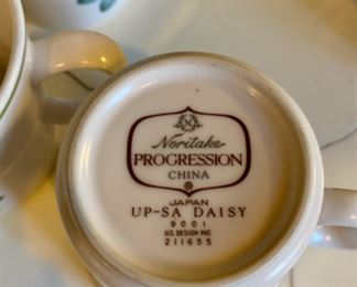 Lot 6122. $125.00. Noritake Mid Century Progression China Pieces "Daisy" (8 coffee cups, 6 saucers, 2 rectangular serving bowls, 1 round serving bowl, 6 salad/soup bowls, 5 Bread Plates, 2 lidded bakeware, Gravy boat, sugar and creamer). We have dinner plates for this set, but the flowers have worn off on the majority of them and felt it detracted from the beauty of these pieces. The buyer of this set is welcome to have the dinner plates as well. There are at least 6 dinner plates (there are probably more than that, but I don't remember the full number).