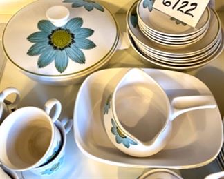 Lot 6122. $125.00. Noritake Mid Century Progression China Pieces "Daisy" (8 coffee cups, 6 saucers, 2 rectangular serving bowls, 1 round serving bowl, 6 salad/soup bowls, 5 Bread Plates, 2 lidded bakeware, Gravy boat, sugar and creamer). We have dinner plates for this set, but the flowers have worn off on the majority of them and felt it detracted from the beauty of these pieces. The buyer of this set is welcome to have the dinner plates as well. There are at least 6 dinner plates (there are probably more than that, but I don't remember the full number).