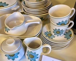 Lot 6122. $125.00. Noritake Mid Century Progression China Pieces "Daisy" (8 coffee cups, 6 saucers, 2 rectangular serving bowls, 1 round serving bowl, 6 salad/soup bowls, 5 Bread Plates, 2 lidded bakeware, Gravy boat, sugar and creamer). We have dinner plates for this set, but the flowers have worn off on the majority of them and felt it detracted from the beauty of these pieces. The buyer of this set is welcome to have the dinner plates as well. There are at least 6 dinner plates (there are probably more than that, but I don't remember the full number).