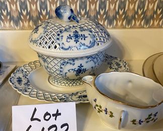 Lot 6132. $120.00. Antique Meissen Blue/White Soup Tureen w/underplate, in a lattice-work design,.we believe it's marked with the 1934 Meissen Mark of crossed swords. Made in Germany. Has a couple rim chips, but seem not to show. Also, Bonus: a Two-Spouted, 2 Handled Pitcher or Creamer, with a spout on either end. one spout is marked "M" and one "G", measures 6.5" in length, 5" from handle to handle. Such an unusual piece! Bottom is marked Made in France.