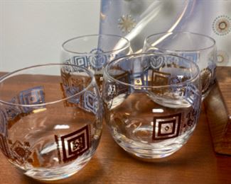 Lot 6133. $28.00 Mid Century Vintage Starburst serving tray. Also included is a set of Mid Century Cocktail glass set, with both 3" and 2" We are throwing in the little pitcher as the bottom is cloudy. the Tray Has a purpley hue and would be perfect for that crudite.