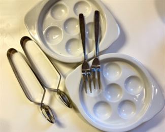 Lot 6135. $40.00 Glass Serving/Prep Package. Shrimp Cocktail serving bowl, (Bottom holds ice, top the shrimp, Water or Juice Pitcher, Pyrex 1.5 qt. casserole dish, cute footed salt bowl and 2 white escargo sets with white baking dishes, 2 fish forks and 2 escargo "tongs".