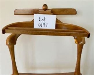 Lot 6141. $75.00 Fitwell Valet by C.Birnbaum Ltd. w/driftwood handled shoe horn that connects on a brass hook. Needs one more screw and wing to even it out.