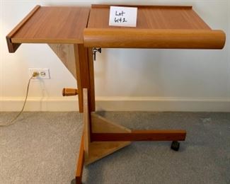 Lot 6142. $95.00 Adjustable Bedside/Work reading Station. Made in Denmark. The homeowners rigged it so it was a little more stable. This would be a great workstation.