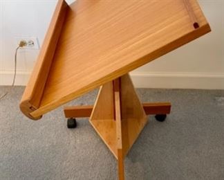 Lot 6142. $95.00 Adjustable Bedside/Work reading Station. Made in Denmark. The homeowners rigged it so it was a little more stable. This would be a great workstation.