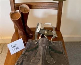 Lot 6146. $60.00 Child Size leather boots with some kind of weight on the inside, these could be used as a book end or decor. Also a Spain-Made Beret with an Eagle Emblem and a pair of Leather Child size Leiderhosen.
