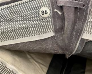 Lot 6146. $60.00. Child Size leather boots with some kind of weight on the inside, these could be used as a book end or decor. Also a Spain-Made Bseret with an Eagle Emblem and a pair of Leather Child size Leiderhosen.