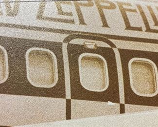 Lot 6175. $25.00. Led Zeppelin Framed Sepia Print Featuring all Band Members and the Led Zeppelin Plane. 36" W x 24" H