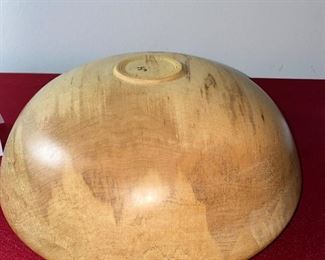 Lot 6164. $45.00. Hand-turned wooden bowl with JH on the bottom. The bowl is made of one piece of wood and appears to be some sort of wormwood, but after exhausting a search, we really aren't sure what the wood is exactly. All we know is this is a very unique and attractive bowl! 13"w x 6"h