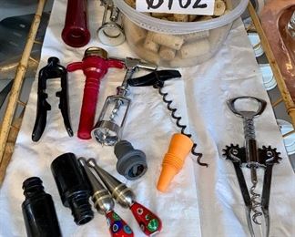 Lot 6162. $25.00. Lot of 13 wine related utensils, plus a bowl of corks!