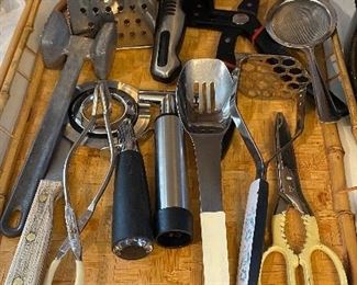 Lot 6158. $35.00. Gadgets! Box Grater, Meat Tenderizer, Pizza Cutter, Tongs, slotted Spoon, Potato Masher, Utility Scissors, Strainer (stainless), wine Vacuum Pump, Farberware knife sharpener, RoBo Grip Pliers.