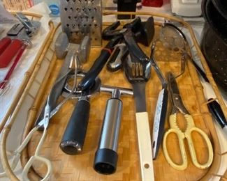 Lot 6158. $35.00. Gadgets! Box Grater, Meat Tenderizer, Pizza Cutter, Tongs, slotted Spoon, Potato Masher, Utility Scissors, Strainer (stainless), wine Vacuum Pump, RoBo Grip Pliers.