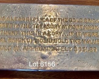 Lot 6156. $75.00. Lot of Random but cool items: 1.Univ. of Miami Heritage Society Paperweight, 2, The Great Seal of State of Montana Pewter Gelt Buckle c.1986, 3, Three little resin figurines, 4. 3 tie pins - one tiger eye, one genuine mother of pearl and one onyx or similar, 5, Tie clip by Hickock, 6.One Replica of Gold Bar (heavy), 7. Good Conduct Medal from WW2, c. 1944 in Box, 8. Pewter Belt Buckle Crest, 9. Clan Crest Murray Clan - Scotland, 10. Photo of W.C. Fields
