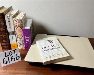Lot 6166. $22.00. Cute vintage lap desk, with a page-a-day gallery calendar, Jane Austen trio of books, Cromwell, and a leather-bound dictionary.