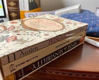 Lot 6166. $22.00. Cute vintage lap desk, with a page-a-day gallery calendar, Jane Austen trio of books, Cromwell, and a leather-bound dictionary.