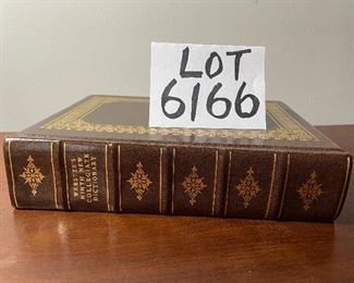 Lot 6166. $22.00. Cute vintage lap desk, with a page-a-day gallery calendar, Jane Austen trio of books, Cromwell, and a leather-bound dictionary.