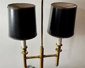 Lot 6014. $80.00. In the style of a Chapman Lamp, 2 light brass fixtures with black shades, 16" x 30.5" t x 7"dia shade, 6" square base. Unmarked. The shades are not in perfect shape, but the lamp makes a statement!