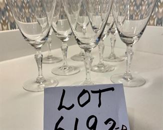 Lot 6192A. $32.00. Lot of 8 Fostoria Water Goblets or Wine Stems 7"tall with Fostoria marking on base. Silver rim.