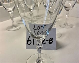 Lot 6192B. $36.00. Lot of 9 Fostoria Water Goblets or Wine Stems 7"tall with Fostoria marking on base. Silver rim. $36.00