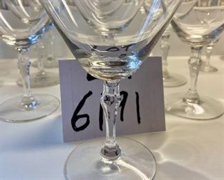 Lot 6191. $40.00. Ten Fostoria clear stems w/silver rim for champagne or sorbet (5.5"t) with 2 larger cordial (5.25"t) and 5 small cordials