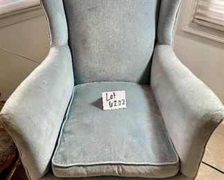 Lot 6202. $95.00. Blue Velveteen Arm chair with the coolest legs! This piece might be able to be steam cleaned well, but also might just be a great candidate for reupholstery. The potential with this piece is mind-boggling! 37"t x 26"d x 27"w x 17" to seat.