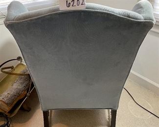 Lot 6202. $95.00. Blue Velveteen Arm chair with the coolest legs! This piece might be able to be steam cleaned well, but also might just be a great candidate for reupholstery. The potential with this piece is mind-boggling! 37"t x 26"d x 27"w x 17" to seat.