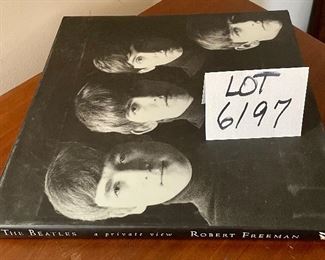 Lot 6197. $30.00. Rock Books: Harmony Illustrated Encylopedia, The Beatles- by Geoffrey Strokes, The Beatles A private view by Robert Freeman