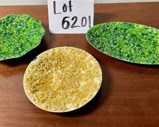 Lot 6201. $90.00. A trio of mid-century enamel on copper pieces from Gerte Hacker. They are all signed and have a pebble tray. Scalloped green: 5.5"dia, yellow dish: 5.25"dia, and oval: 7.5"x4.5"