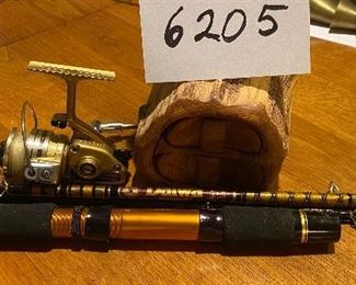 Lot 6205. $30.00 Daiwa Fishing Rod and Reel and a nifty 2-drawer jewelry box made from a piece of driftwood. Includes a teeny tiny Ram carved out of wood also. See Pics!